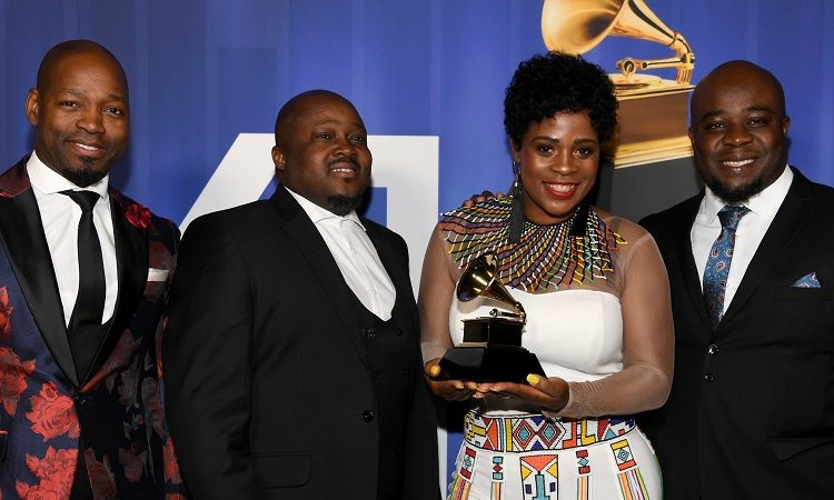 LOS ANGELES, CA - FEBRUARY 10: Soweto Gospel Choir pose with their award at the 61st Annual GRAMMY Awards Premiere Ceremony at Microsoft Theater on February 10, 2019 in Los Angeles, California.   Emma McIntyre/Getty Images for The Recording Academy/AFP