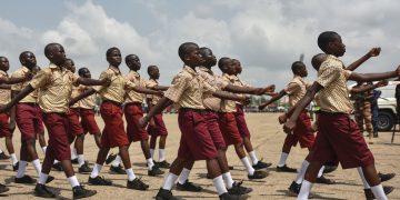 Students march during the celebration of Ghana's 60 years of independence on March 6 in Accra.