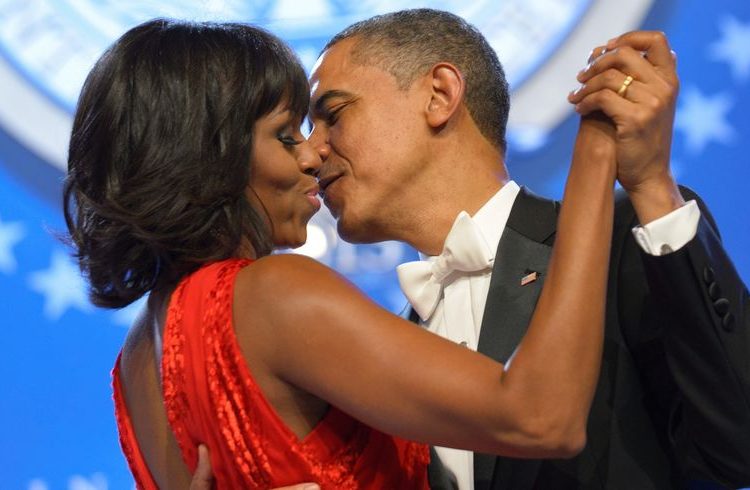Obama and wife kissing