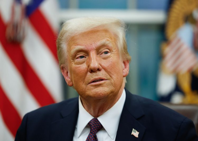 WASHINGTON, DC - JANUARY 20: President Donald Trump signs executive orders in the Oval Office on January 20, 2025 in Washington, DC. Trump takes office for his second term as the 47th president of the United States. (Photo by Anna Moneymaker/Getty Images)