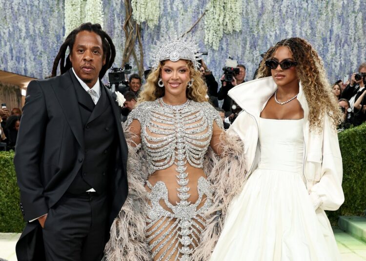 NEW YORK, NEW YORK - MAY 04: (L-R) Jay-Z, Beyoncé and Blue Ivy Carter attend the 2026 Met Gala celebrating "Costume Art" at the Metropolitan Museum of Art on May 04, 2026 in New York City. (Photo by Jamie McCarthy/Getty Images)